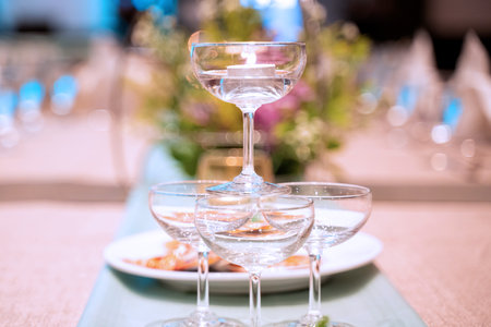 Elegance of glasses on table set up for dinning room.の写真素材
