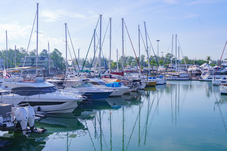 Yacht and boats in a little port at the marina.の写真素材