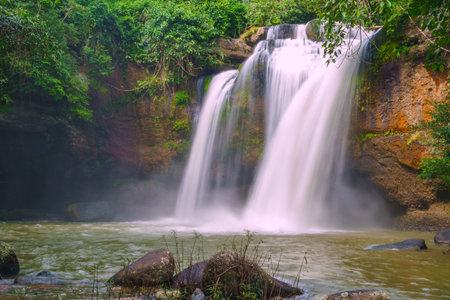 Beautiful waterfall with sunlight in jungle, Haew Suwat Waterfall at khao yai Nakhonratchasima province.の写真素材
