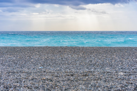 The pebbled Qixing beach in Hualien and the rocks on a fine winter day.の写真素材