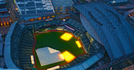 Seattle Washington USA - March 12 2018 Safeco Field Retractable Roof Open Air Baseball Stadium Where Seattle Mariners Play Aerial Top Down View Empty at Nightのeditorial素材