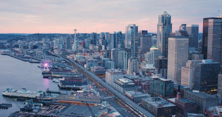 Seattle Waterfront Ferry Terminal Downtown Buildings Sunset Viewの写真素材