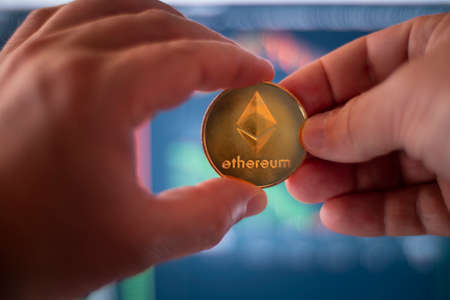 Ethereum Ether ETH Crypto Currency Token Altcoin Digital Money Two Person Financial Transaction Conceptの写真素材