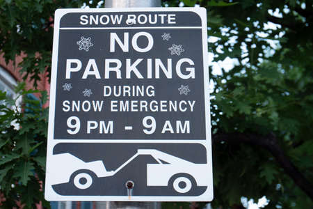 Snow Route No Parking During Snow Emergency 9pm-9am Street Signの写真素材