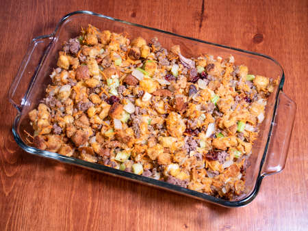 Stuffing With Beef Carrots Bread Celery Almonds Onions Crutons Cranberries In Glass Serving Bowlの写真素材