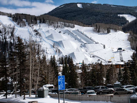 Vail Colorado USA - Feb 23 2019 Ski and Snowboard Terrain Park at Vail Ski Resort with Half Pipe Jumpsのeditorial素材