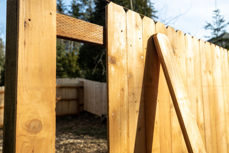 Cedar Wood Fence With Missing Boards - Fencing Construction Buildの写真素材