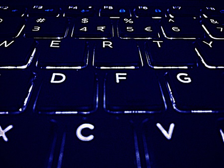 Close up of keyboard - digital and hacker Concept