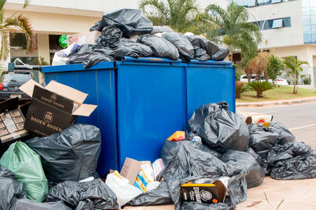 Brasilia, Brazil-February 10, 2020: Trash Pile up high and overflowing in a Neighborhood in the Northwest Section of Brasiliaのeditorial素材