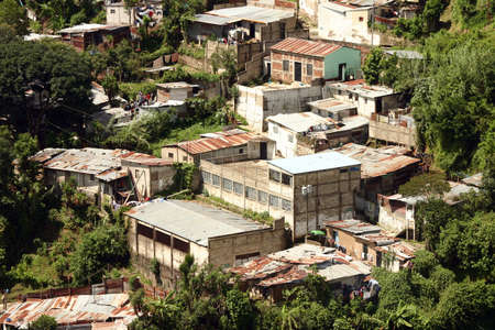 Guatemala City, Guatemala August 7, 2006: The poor homes of people that live under or near the Incienso Bridge in Guatemala City.のeditorial素材
