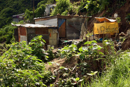 Guatemala City, Guatemala August 7, 2006: The poor homes of people that live under or near the Incienso Bridge in Guatemala City.のeditorial素材