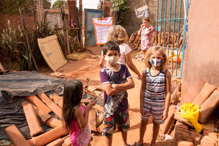 Planaltina Goias, Brazil-May 29, 2021: Some Young Children out in front of their home in the impoverished community of Planaltinaのeditorial素材