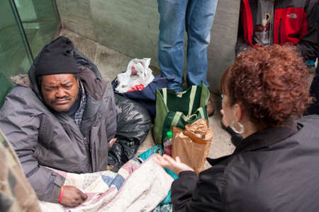 Washington DC February 5 2011: Volunteers helping feed homeless people in downtown Washingtonのeditorial素材