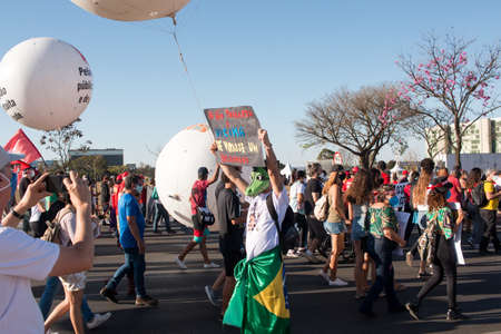 Brasilia, Brazil, DF July 25, 2021: A massive protest in the capital city and also throughout Brazil, against the current administrationâs handling of the Covid-19 Vaccine.のeditorial素材