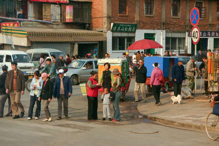 Kunming, China, March 19, 2006: The Busy Streets and markets of Downtown Kunmingのeditorial素材
