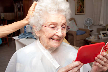 Elderly Lady getting a Haircut in the comfort of her home
