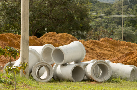 Concrete pipe waiting to be laid in a Northwest neighborhood in Brasilia, Brazilの写真素材