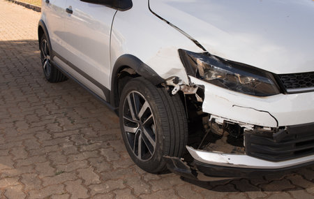 Right front end of a compact car that was damaged in a collisionの写真素材
