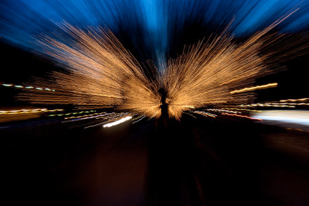 Abstract, photo of motion blur of colorful lights at nightの写真素材