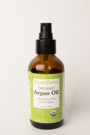 El Paso, Texas, August 18 2023 Close up of a bottle of Argan Oil used for face, skin and hair careのeditorial素材