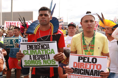Brasilia, Brazil, August 30 2023 Indigenous Indians from Different parts of Brazil, Marching down the Esplanada dos Ministerios for The Future for our Children March in Brasiliaのeditorial素材