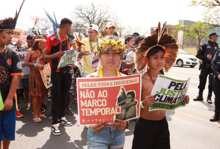 Brasilia, Brazil, August 30 2023 Indigenous Indians from Different parts of Brazil, Marching down the Esplanada dos Ministerios for The Future for our Children March in Brasiliaのeditorial素材