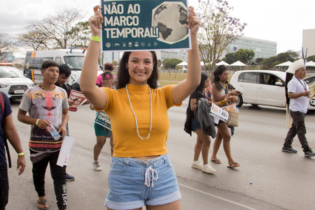 Brasilia, Brazil, August 30 2023 Indigenous Indians from Different parts of Brazil, Marching down the Esplanada dos Ministerios for The Future for our Children March in Brasiliaのeditorial素材