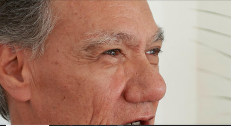Close up Â¾ portrait of a senior man looking off in the distanceの写真素材