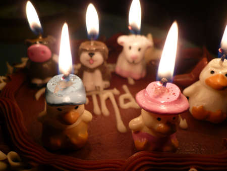 birthday cake with lighted candlesの写真素材