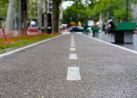 low shot of a cycle track in a townの写真素材