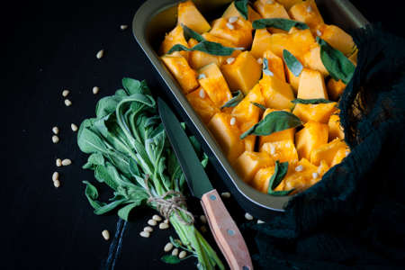 Pumpkin with salvia and pine nutsの写真素材