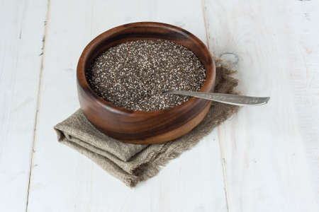 Superfood Chia seeds in a wooden bowlの写真素材