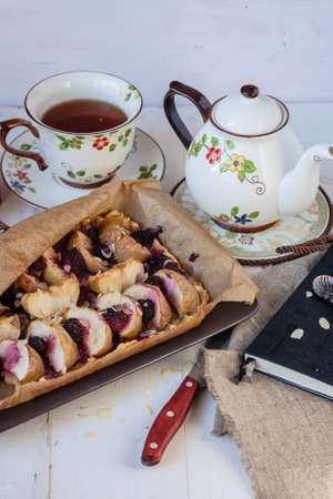 Shortbread apple pie with blackberry and almondsの写真素材