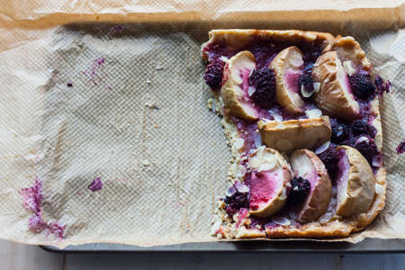 Shortbread apple pie with blackberry and almondsの写真素材