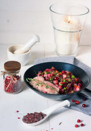Roastbeef with seasoned beetroot, green peas and cranberries saladの写真素材