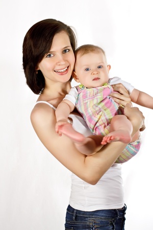 Smiling young mother and babyの写真素材