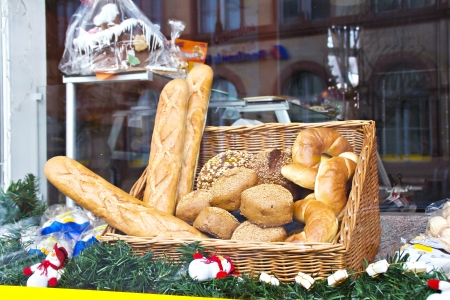 Shop window of a bakery with various breadsの写真素材