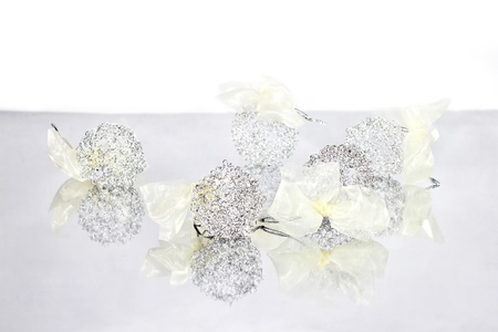 Christmas silver balls on the mirror backgroundの写真素材