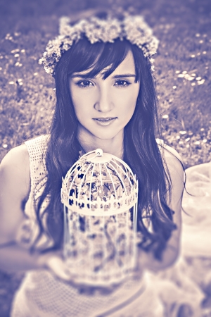 Fashion portrait of young sensual woman in the spring gardenの写真素材