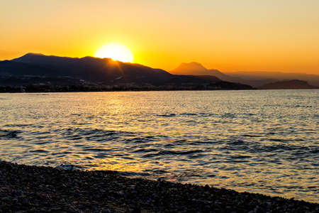 Sunrise at rocky sea coast in Turkeyの写真素材