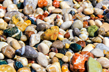 Fragment of colourful beach gravel as a backgroundの写真素材