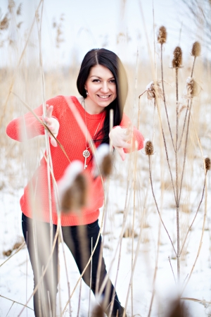 Young woman outdoors portrait. Winter season.の写真素材