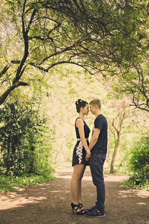 Romantic date in park in sunny dayの写真素材