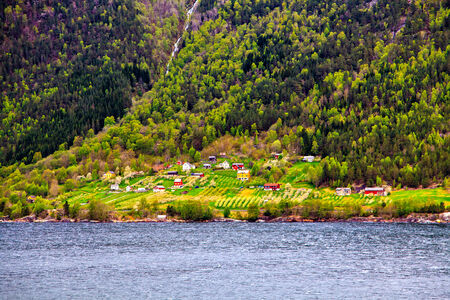 Traditional village on the foot of mountain, Norwayの写真素材