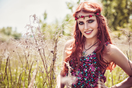 Romantic beautiful girl outdoors in summer, hippie styleの写真素材