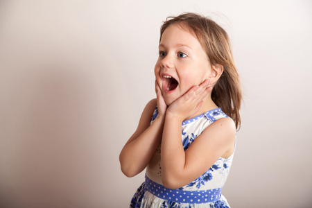 Little girl screaming, portraitの写真素材