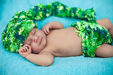 Portrait of a beautiful sleeping newborn baby boyの写真素材