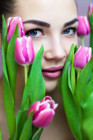 Lady With Pink Tulipsの写真素材