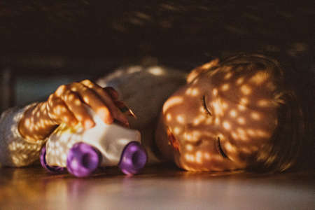 Sweet dreams, little child sleeping with car and starsの写真素材