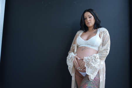 Pregnant wife wearing white clothes
